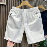 2026 new slim fit casual white shorts for men in summer, thin and loose five quarter pants, mid length pants for men, trendy and high-end