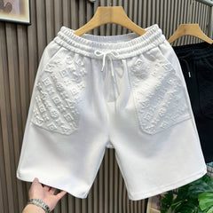 European high-end embossed technology casual sports shorts men's trendy brand 2026 summer new beach five quarter pants