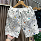European high-end fashion jacquard embroidery casual sports shorts men's trendy brand 2026 summer beach five quarter pants