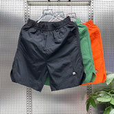 2026 summer new thin loose straight leg casual shorts for men, ice silk quick drying sports five quarter shorts, beach pants