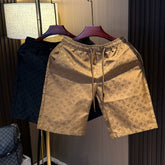 High end light luxury printed trendy versatile shorts for men in summer 2025, new fashion trend ice silk casual beach pants
