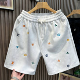 Light luxury European goods high-end fashion embroidered casual sports shorts men's trendy brand 2026 summer new beach five quarter pants