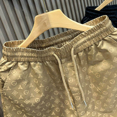 Summer New Men's Ice Silk Shorts Beach Pants High end Light Luxury Printed Trendy Versatile Pique Handsome Quick Drying Pentagram Pants