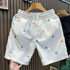 Trendy brand shorts men's summer new fashion design sense embroidered letter five quarter pants youth quick drying breathable beach pants