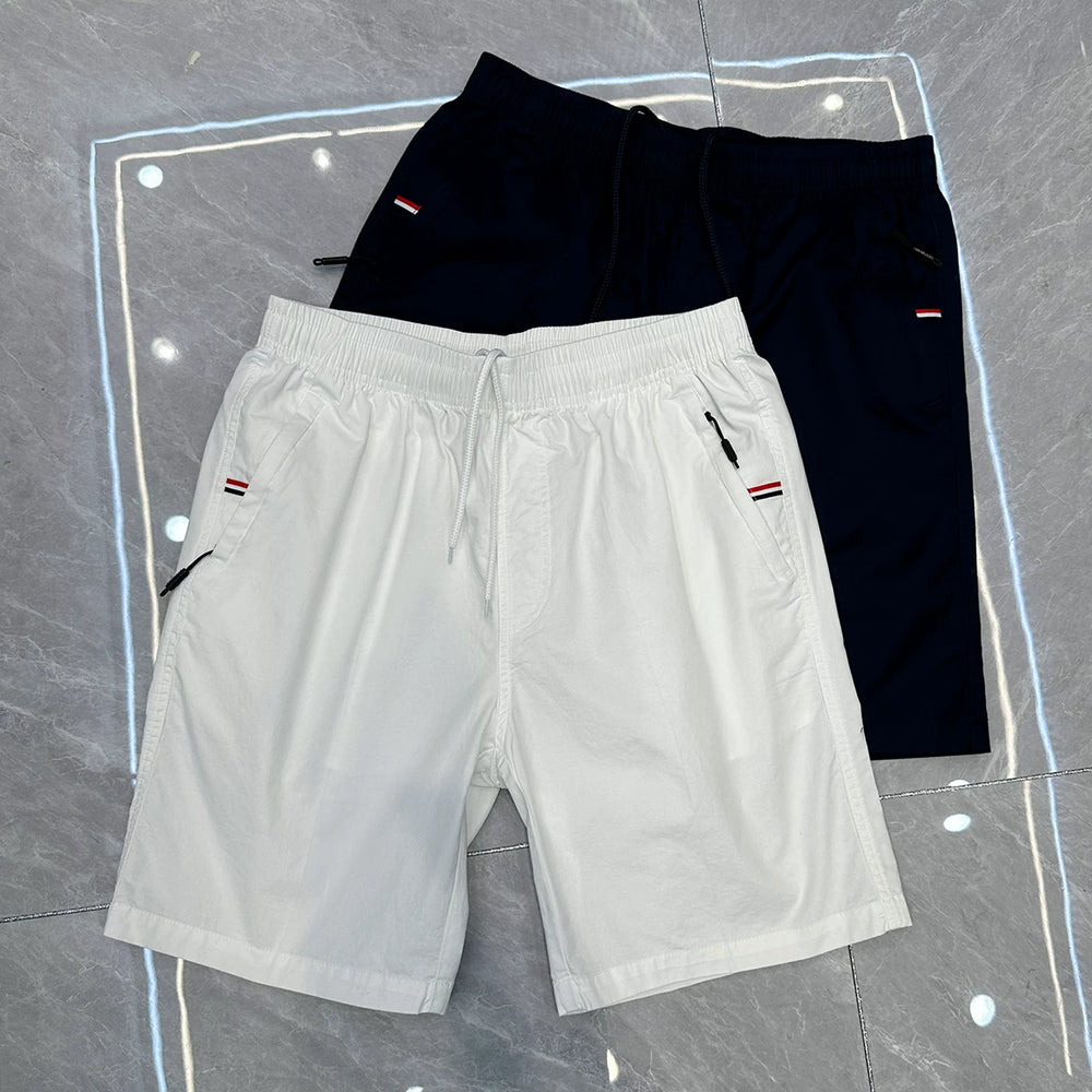 2026 new slim fit casual white shorts for men in summer, thin and loose five quarter pants, mid length pants for men, trendy and high-end