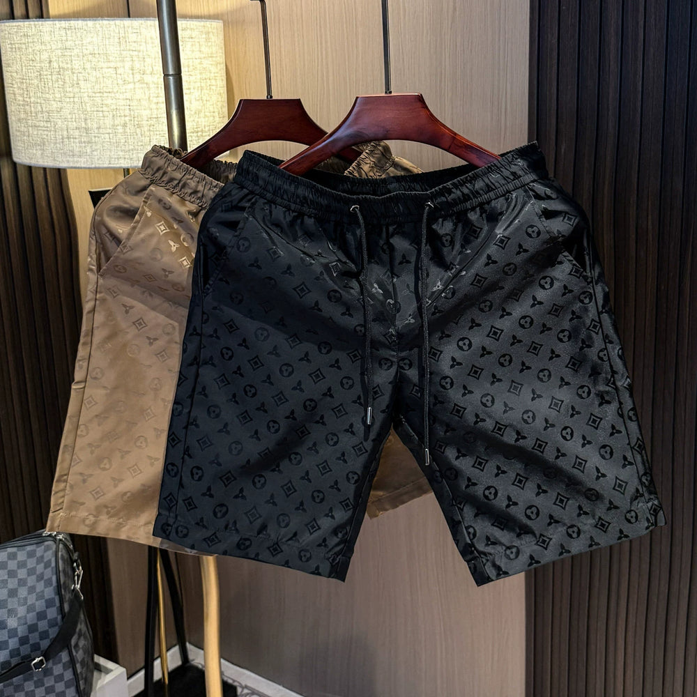 High end light luxury printed trendy versatile shorts for men in summer 2025, new fashion trend ice silk casual beach pants
