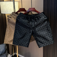 High end light luxury printed trendy versatile shorts for men in summer 2025, new fashion trend ice silk casual beach pants
