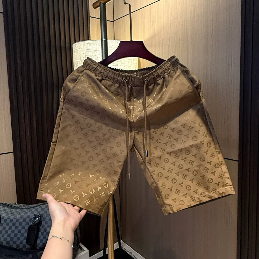 High end light luxury printed trendy versatile shorts for men in summer 2025, new fashion trend ice silk casual beach pants