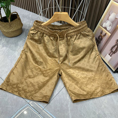 Summer New Men's Ice Silk Shorts Beach Pants High end Light Luxury Printed Trendy Versatile Pique Handsome Quick Drying Pentagram Pants