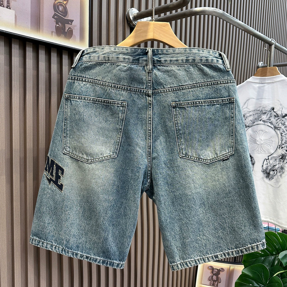 Patched ripped denim shorts for men in summer 2026, thin, American retro embroidered mid length, loose straight leg cropped pants