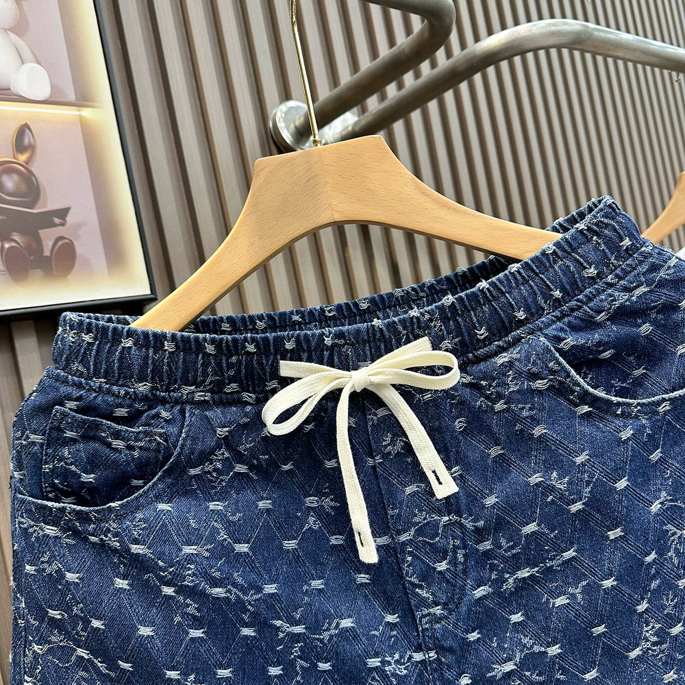 2026 summer new American denim shorts for men, loose and casual five quarter pants with drawstring and elastic waist, trendy brand versatile