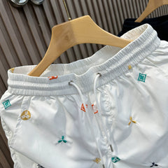 Trendy brand shorts men's summer new fashion design sense embroidered letter five quarter pants youth quick drying breathable beach pants