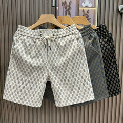 European high-end brand casual shorts men's trendy brand trend outerwear 2026 summer new men's beach five quarter pants